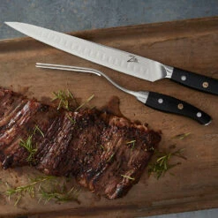 Alpha-Royal Japanese Serie 10" Tranchierbesteck Damaszener-Stahl 12 Alpha-Royal Japanese Serie 10" Tranchierbesteck Damaszener-Stahl -Küchenbedarf Angebote 10038991 de 0005 logo